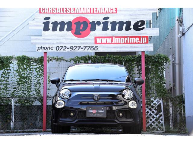 アバルト595 コンペティツィオーネ 左ハンドル 70周年記念車 左ハンドル 70th記念車 下取り車両 ワンオーナー 社外ディスプレイオーディオ コートテクトフロントガラス バックソナー レコードモンツァマフラー フロント&リアフォグランプ ブレンボ(4枚目)