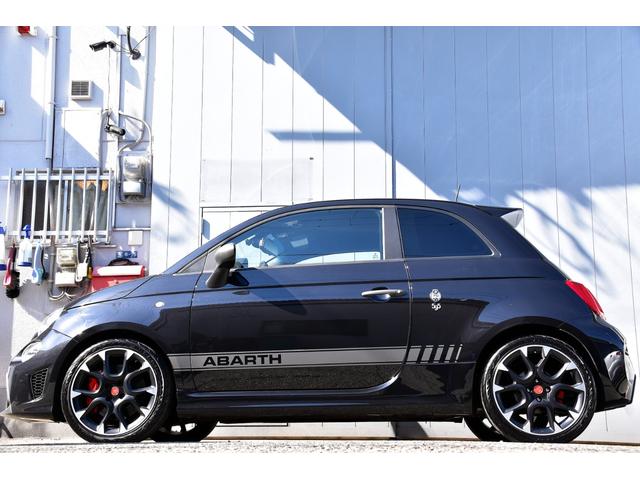 アバルト595 コンペティツィオーネ 左ハンドル 70周年記念車 左ハンドル 70th記念車 下取り車両 ワンオーナー 社外ディスプレイオーディオ コートテクトフロントガラス バックソナー レコードモンツァマフラー フロント&リアフォグランプ ブレンボ(6枚目)