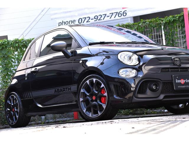 アバルト595 コンペティツィオーネ 左ハンドル 70周年記念車 左ハンドル 70th記念車 下取り車両 ワンオーナー 社外ディスプレイオーディオ コートテクトフロントガラス バックソナー レコードモンツァマフラー フロント&リアフォグランプ ブレンボ(8枚目)
