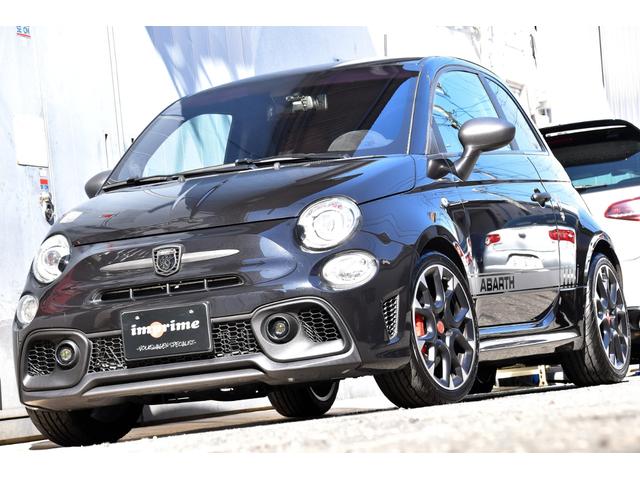 アバルト595 コンペティツィオーネ 左ハンドル 70周年記念車 左ハンドル 70th記念車 下取り車両 ワンオーナー 社外ディスプレイオーディオ コートテクトフロントガラス バックソナー レコードモンツァマフラー フロント&リアフォグランプ ブレンボ(13枚目)