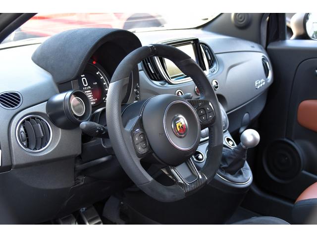 アバルト595 コンペティツィオーネ 左ハンドル 70周年記念車 左ハンドル 70th記念車 下取り車両 ワンオーナー 社外ディスプレイオーディオ コートテクトフロントガラス バックソナー レコードモンツァマフラー フロント&リアフォグランプ ブレンボ(68枚目)