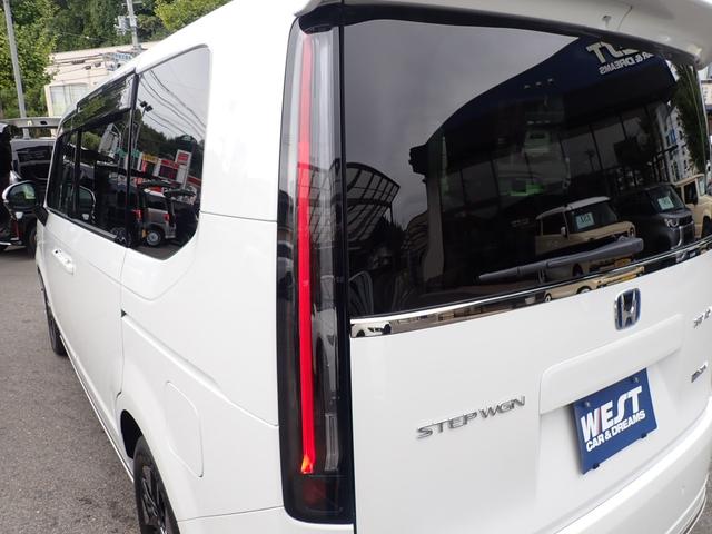 ステップワゴン ｅ：ＨＥＶスパーダ　純正１１．４インチナビ　純正１０インチフリップダウンモニター　両側電動スライドドア　全方位カメラ　ハーフレザーシート　ビルドインＥＴＣ　純正前後ドライブレコーダー　クリアランスソナー（25枚目）