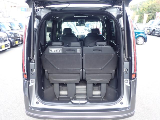 ステップワゴン ｅ：ＨＥＶスパーダ　純正９型ナビ　純正１０型フリップダウンモニター　フルセグ　ＣＤ録音　ＤＶＤ　Ｂｌｕｅｔｏｏｔｈオーディオ　バックカメラ　ビルドインＥＴＣ　両側パワースライドドア　ホンダセンシング（12枚目）