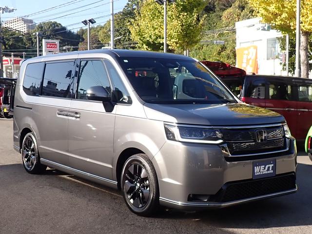 ステップワゴン ｅ：ＨＥＶスパーダ　純正９型ナビ　純正１０型フリップダウンモニター　フルセグ　ＣＤ録音　ＤＶＤ　Ｂｌｕｅｔｏｏｔｈオーディオ　バックカメラ　ビルドインＥＴＣ　両側パワースライドドア　ホンダセンシング（17枚目）