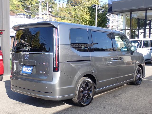 ステップワゴン ｅ：ＨＥＶスパーダ　純正９型ナビ　純正１０型フリップダウンモニター　フルセグ　ＣＤ録音　ＤＶＤ　Ｂｌｕｅｔｏｏｔｈオーディオ　バックカメラ　ビルドインＥＴＣ　両側パワースライドドア　ホンダセンシング（19枚目）