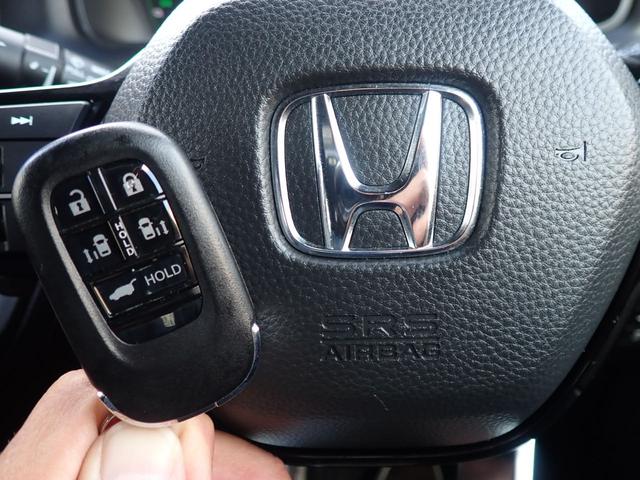 ステップワゴン ｅ：ＨＥＶスパーダ　純正９型ナビ　純正１０型フリップダウンモニター　フルセグ　ＣＤ録音　ＤＶＤ　Ｂｌｕｅｔｏｏｔｈオーディオ　バックカメラ　ビルドインＥＴＣ　両側パワースライドドア　ホンダセンシング（34枚目）