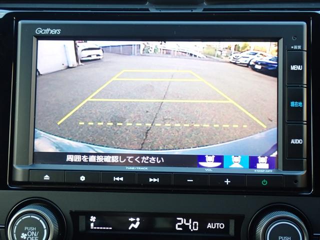 シビック ハッチバック　純正７型ナビ　ＣＤ　Ｂｌｕｅｔｏｏｔｈオーディオ　バックカメラ　ビルドイン２．０ＥＴＣ　純正フルエアロ　前席シートヒーター　前席パワーシート　ハーフレザーシート　リアスポイラー　ホンダセンシング（4枚目）