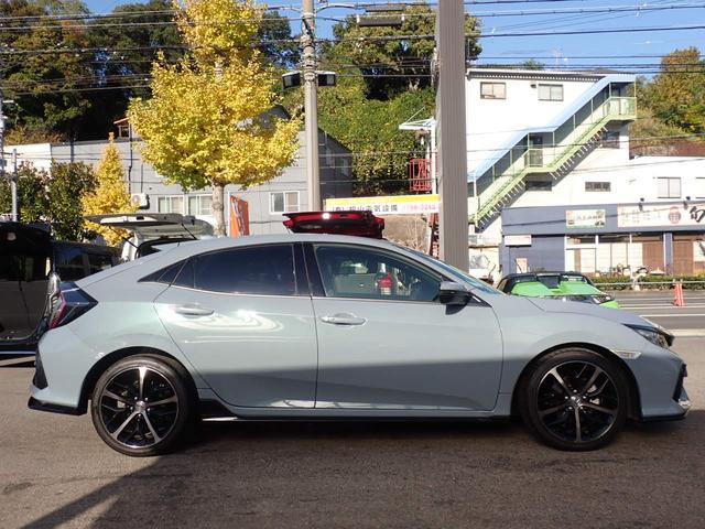 シビック ハッチバック　純正７型ナビ　ＣＤ　Ｂｌｕｅｔｏｏｔｈオーディオ　バックカメラ　ビルドイン２．０ＥＴＣ　純正フルエアロ　前席シートヒーター　前席パワーシート　ハーフレザーシート　リアスポイラー　ホンダセンシング（17枚目）