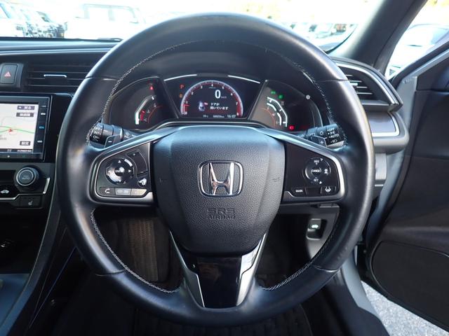 シビック ハッチバック　純正７型ナビ　ＣＤ　Ｂｌｕｅｔｏｏｔｈオーディオ　バックカメラ　ビルドイン２．０ＥＴＣ　純正フルエアロ　前席シートヒーター　前席パワーシート　ハーフレザーシート　リアスポイラー　ホンダセンシング（25枚目）