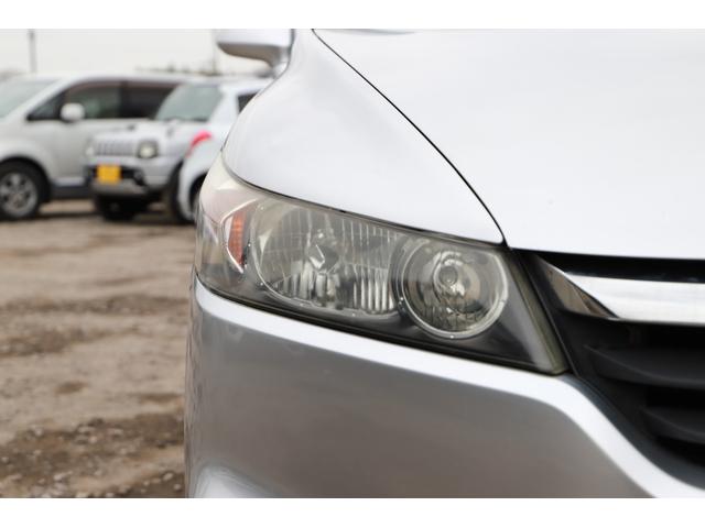 ストリーム Ｇ　スタイリッシュパッケージ　キーレス　ＥＴＣ　純正ナビ　ワンセグＴＶ　バックカメラ　社外１５インチＡＷ（12枚目）