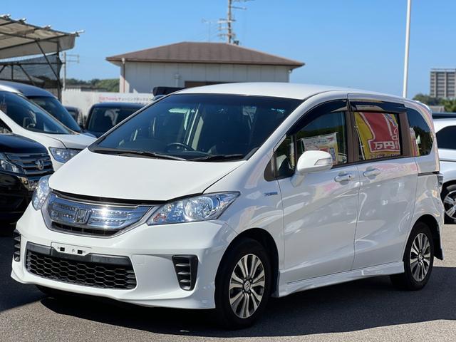 フリードハイブリッド ジャストセレクション ハイブリッド車/ドライブレコーダー前後/クルーズコントロール/オートライト/両側電動スライドドア/スマートキー/ETC/(11枚目)