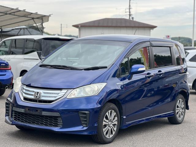 フリードハイブリッド ジャストセレクション　純正ナビ／バックカメラ／クルーズコントロール／オートライト／両側電動スライドドア／スマートキー／ＥＴＣ／ハーフレザーシート（11枚目）