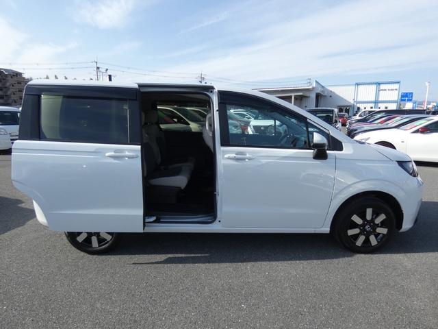 フリード e:HEVエアー EX ホンダセンシング 両側パワースライドドア ハーフレザーシート シートヒーター フルLEDヘッドランプ メモリーナビ フルセグ バックカメラ 純正15インチAW ウォークスルー 禁煙車 スマートキー(20枚目)