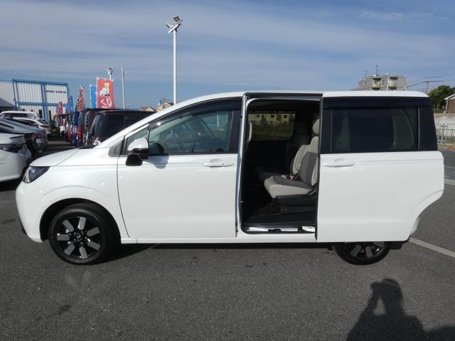 フリード e:HEVエアー EX ホンダセンシング 両側パワースライドドア ハーフレザーシート シートヒーター フルLEDヘッドランプ メモリーナビ フルセグ バックカメラ 純正15インチAW ウォークスルー 禁煙車 スマートキー(21枚目)