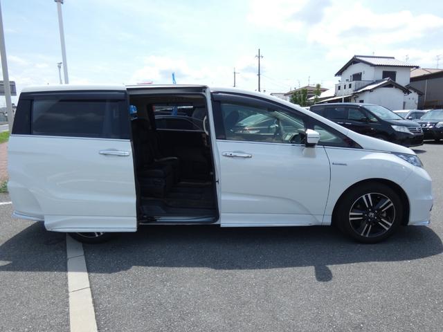 オデッセイハイブリッド ハイブリッドアブソルート・EXホンダセンシング ホンダセンシング 両側電動スライドドア 後席モニター Bスポットモニター ハーフレザーシート 純正ナビ フルセグ 全周囲カメラ ETC LEDヘッドランプ 純正17インチAW パワーシート オットマン(20枚目)