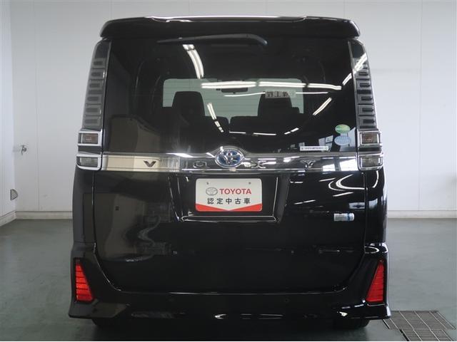 ヴォクシー ハイブリッドＺＳ　煌ＩＩＩ　アイドリングストップ　地デジＴＶ　リヤカメラ　１オナ車　Ｗエアコン　スマートキー　ＤＶＤ再生可　クルコン　ＶＳＣ　キーレス　アルミホイール　ナビ＆ＴＶ　ＬＥＤヘッドランプ　ＥＴＣ　３列シート　ＡＢＳ（5枚目）