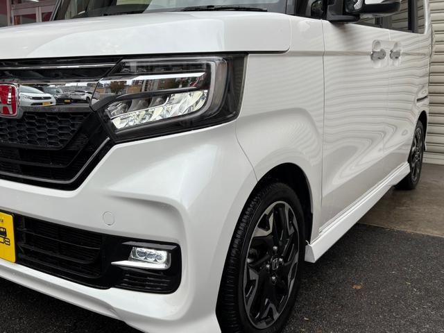 N-BOXカスタム G・Lターボホンダセンシング 禁煙 1オーナ 整備記録 10インチプレミアムインターナビ Bカメラ ナビ連動ドライブレコーダー DVDBT対応 ETC シートヒーター 両側パワースライド LEDヘッドライト スマートキー(6枚目)
