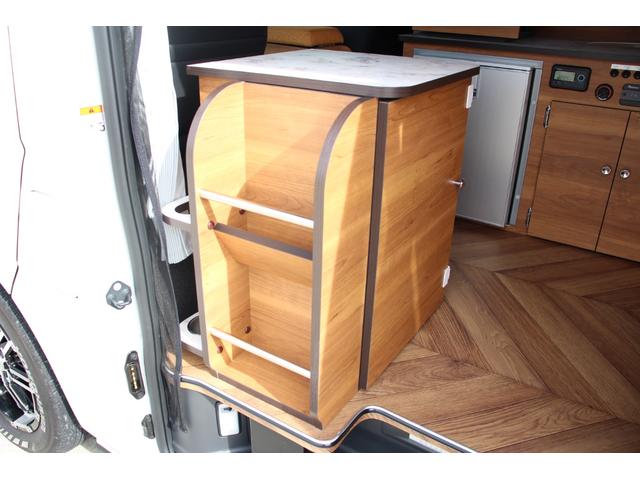 ハイエースバン キャンピングカー長野 スペースキャンパー 軽油 6名乗車 リチウム300Ah FFヒーター ウインドウエアコン ソーラーパネル 電子レンジ PIVOTクルコン 2000Wインバーター マックスファン メモリーナビ 冷蔵庫 防虫ネット TSS(34枚目)