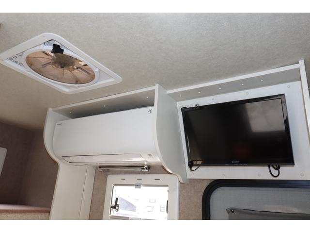 ボンゴトラック キャンパーアシスト　ジョクト　６名乗車　ＦＦヒーター　家庭用エアコン　ソーラーパネル　電子レンジ　マックスファン　１５００Ｗインバーター　ポータブル発電機　サイドオーニング　リチウム＆鉛バッテリー　キャンピングカー　キャブコン（7枚目）