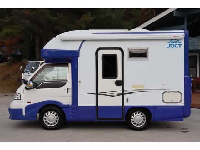 ボンゴトラック キャンパーアシスト　ジョクト　６名乗車　ＦＦヒーター　家庭用エアコン　ソーラーパネル　電子レンジ　マックスファン　１５００Ｗインバーター　ポータブル発電機　サイドオーニング　リチウム＆鉛バッテリー　キャンピングカー　キャブコン（16枚目）