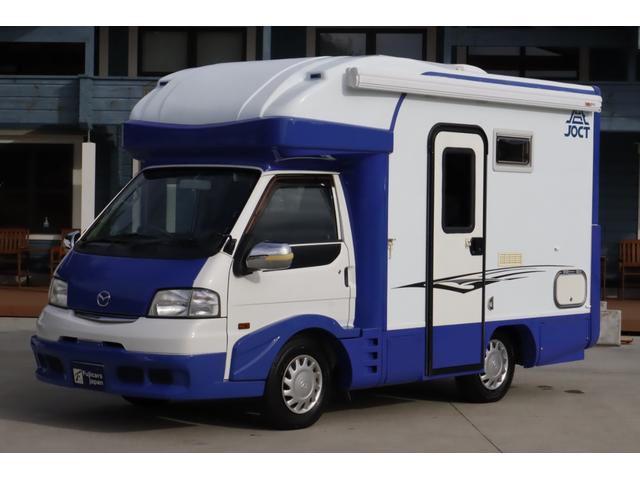 ボンゴトラック キャンパーアシスト　ジョクト　６名乗車　ＦＦヒーター　家庭用エアコン　ソーラーパネル　電子レンジ　マックスファン　１５００Ｗインバーター　ポータブル発電機　サイドオーニング　リチウム＆鉛バッテリー　キャンピングカー　キャブコン（28枚目）