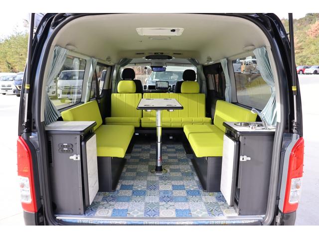 ハイエースバン トヨタテックス　Ｐキューブ　プラスネオ　９名乗車　ツインサブ　ＦＦヒーター　１５００Ｗインバーター　マックスファン　サイドオーニング　社外ショックアブソーバー　社外スタビライザー　ビッグＸ１１　フリップダウンモニター　キャンピングカー（4枚目）