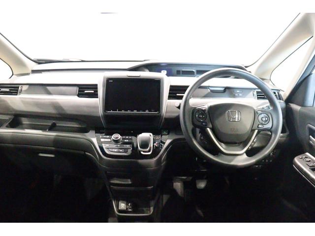 フリード＋ハイブリッド ハイブリッドＧブラックスタイル　衝突被害軽減システム　純正メモリーナビ　５人乗　アダプティブクルーズ　Ｂカメラ　ＡＷ　ＥＴＣ　両側電動スライドドア　フルセグＴＶ　ＬＥＤヘッドライト　ＵＳＢ入力端子　Ｂｌｕｅｔｏｏｔｈ接続　ＤＶＤ再生（9枚目）