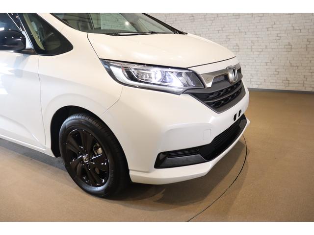 フリード＋ハイブリッド ハイブリッドＧブラックスタイル　衝突被害軽減システム　純正メモリーナビ　５人乗　アダプティブクルーズ　Ｂカメラ　ＡＷ　ＥＴＣ　両側電動スライドドア　フルセグＴＶ　ＬＥＤヘッドライト　ＵＳＢ入力端子　Ｂｌｕｅｔｏｏｔｈ接続　ＤＶＤ再生（29枚目）