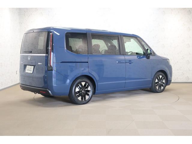 ステップワゴン e:HEVエアー EX 衝突被害軽減システム 純正メモリーナビ 7人乗 アダプティブクルーズ 全周囲カメラ 両側電動スライドドア 電動リアゲート ETC AW 3列シート ドライブレコーダー フルセグTV 後席モニター(30枚目)