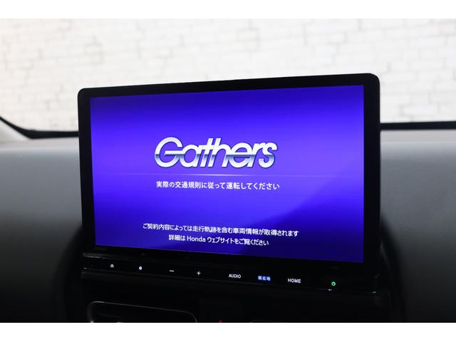 フリード ｅ：ＨＥＶクロスター　衝突被害軽減システム　純正メモリーナビ　５人乗　アダプティブクルーズ　ＥＴＣ　ＡＷ　両側電動スライドドア　Ｂカメラ　フルセグＴＶ　ＬＥＤヘッドライト　ＵＳＢ入力端子　Ｂｌｕｅｔｏｏｔｈ接続　ＤＶＤ再生（2枚目）