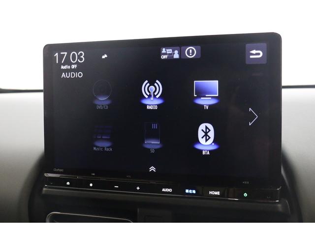 フリード ｅ：ＨＥＶクロスター　衝突被害軽減システム　純正メモリーナビ　５人乗　アダプティブクルーズ　ＥＴＣ　ＡＷ　両側電動スライドドア　Ｂカメラ　フルセグＴＶ　ＬＥＤヘッドライト　ＵＳＢ入力端子　Ｂｌｕｅｔｏｏｔｈ接続　ＤＶＤ再生（5枚目）