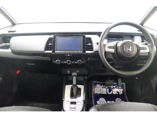 フィット e:HEVホーム 衝突被害軽減システム 純正メモリーナビ アダプティブクルーズ Bカメラ クリアランスソナー ETC フルセグTV LEDヘッドライト USB入力端子 Bluetooth接続 スマートキー ABS(8枚目)