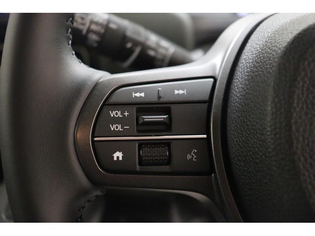 フリード ｅ：ＨＥＶクロスター　衝突被害軽減システム　純正メモリーナビ　クリアランスソナー　クルーズコントロール　両側電動スライドドア　電動格納ミラー　オートライト　レーンアシスト　バックカメラ　Ｂｌｕｅｔｏｏｔｈ接続　ＣＤ　ＤＶＤ（9枚目）