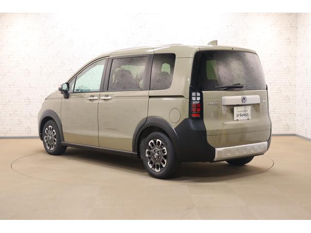 フリード ｅ：ＨＥＶクロスター　衝突被害軽減システム　純正メモリーナビ　クリアランスソナー　クルーズコントロール　両側電動スライドドア　電動格納ミラー　オートライト　レーンアシスト　バックカメラ　Ｂｌｕｅｔｏｏｔｈ接続　ＣＤ　ＤＶＤ（20枚目）