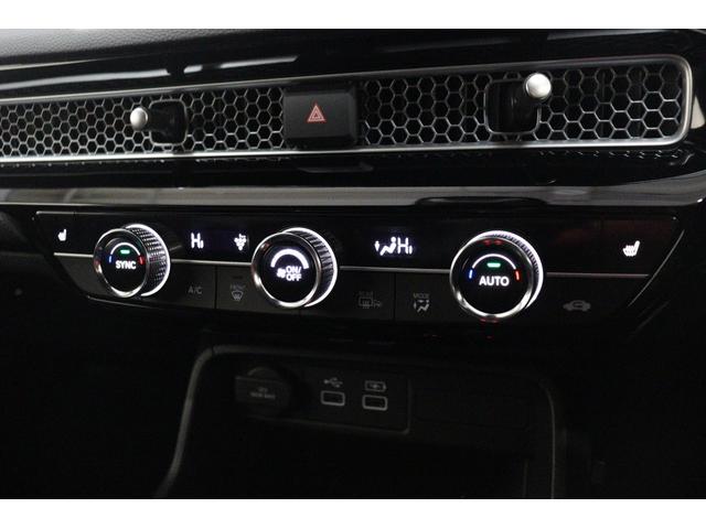 シビック ｅ：ＨＥＶ　衝突被害軽減システム　純正ナビ　クルーズコントロール　レーンアシスト　ＬＥＤ　オートライト　クリアランスソナー　パワーシート　シートヒーター　Ｂｌｕｅｔｏｏｔｈ接続　バックカメラ　ＡＷ　ＥＴＣ２．０（6枚目）