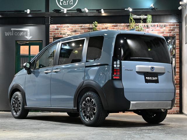 フリード ｅ：ＨＥＶクロスター　ＡＣＣイージーアップ　モンスタタイヤ　アウトドアスタイル　両側パワースライドドア　ルーフレール　スマートキー　クルーズコントロール（24枚目）