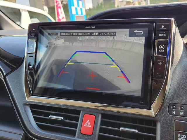 ヴォクシー ZS 煌 8人乗り/アルパイン10インチナビTV/アルパインフリップダウンモニター/Bluetooth/Bカメラ/ETC/ドラレコ/TEIN車高調/社外18アルミ/車両取説・ナビ取説・スペアキー有(34枚目)
