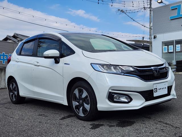 フィットハイブリッド Ｌ　ホンダセンシング　１オーナー・禁煙車／純正ナビＴＶ／Ｂｌｕｅｔｏｏｔｈ／Ｂカメラ／ＥＴＣ／コンビシート／タイヤ４本新品交換渡し／スマートキー＆Ｐスタート／車両取説・ナビ取説・スペアキー有（13枚目）