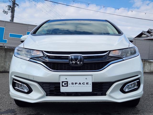 フィットハイブリッド Ｌ　ホンダセンシング　１オーナー・禁煙車／純正ナビＴＶ／Ｂｌｕｅｔｏｏｔｈ／Ｂカメラ／ＥＴＣ／コンビシート／タイヤ４本新品交換渡し／スマートキー＆Ｐスタート／車両取説・ナビ取説・スペアキー有（14枚目）