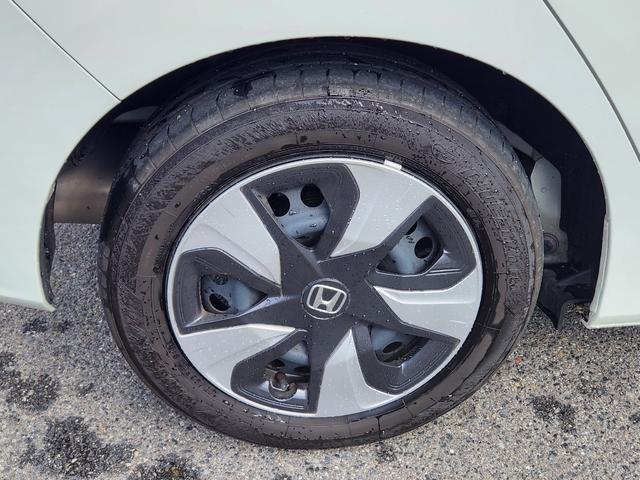 フィットハイブリッド Ｌ　ホンダセンシング　１オーナー・禁煙車／純正ナビＴＶ／Ｂｌｕｅｔｏｏｔｈ／Ｂカメラ／ＥＴＣ／コンビシート／タイヤ４本新品交換渡し／スマートキー＆Ｐスタート／車両取説・ナビ取説・スペアキー有（19枚目）