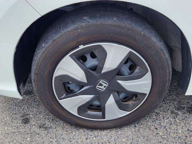 フィットハイブリッド Ｌ　ホンダセンシング　１オーナー・禁煙車／純正ナビＴＶ／Ｂｌｕｅｔｏｏｔｈ／Ｂカメラ／ＥＴＣ／コンビシート／タイヤ４本新品交換渡し／スマートキー＆Ｐスタート／車両取説・ナビ取説・スペアキー有（20枚目）