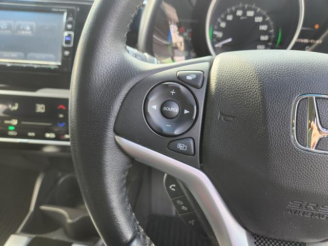 フィットハイブリッド Ｌ　ホンダセンシング　１オーナー・禁煙車／純正ナビＴＶ／Ｂｌｕｅｔｏｏｔｈ／Ｂカメラ／ＥＴＣ／コンビシート／タイヤ４本新品交換渡し／スマートキー＆Ｐスタート／車両取説・ナビ取説・スペアキー有（35枚目）