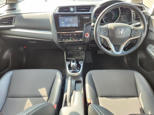 フィットハイブリッド Ｌ　ホンダセンシング　１オーナー・禁煙車／純正ナビＴＶ／Ｂｌｕｅｔｏｏｔｈ／Ｂカメラ／ＥＴＣ／コンビシート／タイヤ４本新品交換渡し／スマートキー＆Ｐスタート／車両取説・ナビ取説・スペアキー有（41枚目）