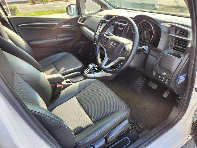 フィットハイブリッド Ｌ　ホンダセンシング　１オーナー・禁煙車／純正ナビＴＶ／Ｂｌｕｅｔｏｏｔｈ／Ｂカメラ／ＥＴＣ／コンビシート／タイヤ４本新品交換渡し／スマートキー＆Ｐスタート／車両取説・ナビ取説・スペアキー有（42枚目）
