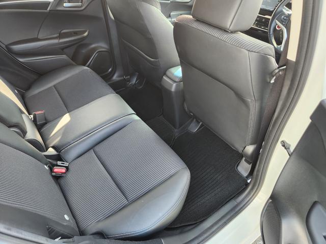 フィットハイブリッド Ｌ　ホンダセンシング　１オーナー・禁煙車／純正ナビＴＶ／Ｂｌｕｅｔｏｏｔｈ／Ｂカメラ／ＥＴＣ／コンビシート／タイヤ４本新品交換渡し／スマートキー＆Ｐスタート／車両取説・ナビ取説・スペアキー有（49枚目）