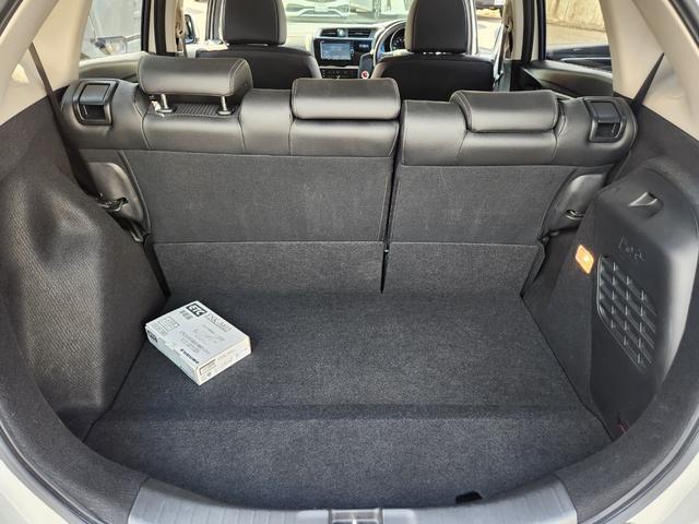フィットハイブリッド Ｌ　ホンダセンシング　１オーナー・禁煙車／純正ナビＴＶ／Ｂｌｕｅｔｏｏｔｈ／Ｂカメラ／ＥＴＣ／コンビシート／タイヤ４本新品交換渡し／スマートキー＆Ｐスタート／車両取説・ナビ取説・スペアキー有（52枚目）