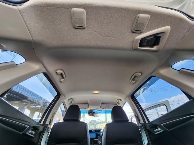 フィットハイブリッド Ｌ　ホンダセンシング　１オーナー・禁煙車／純正ナビＴＶ／Ｂｌｕｅｔｏｏｔｈ／Ｂカメラ／ＥＴＣ／コンビシート／タイヤ４本新品交換渡し／スマートキー＆Ｐスタート／車両取説・ナビ取説・スペアキー有（54枚目）