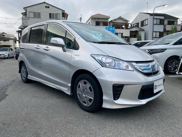 フリードハイブリッド ジャストセレクション　ハイブリッド　両側電動ドア　バックカメラ　禁煙車　ハーフレザーシート　スマートキー　ＥＴＣ　オートライト（2枚目）