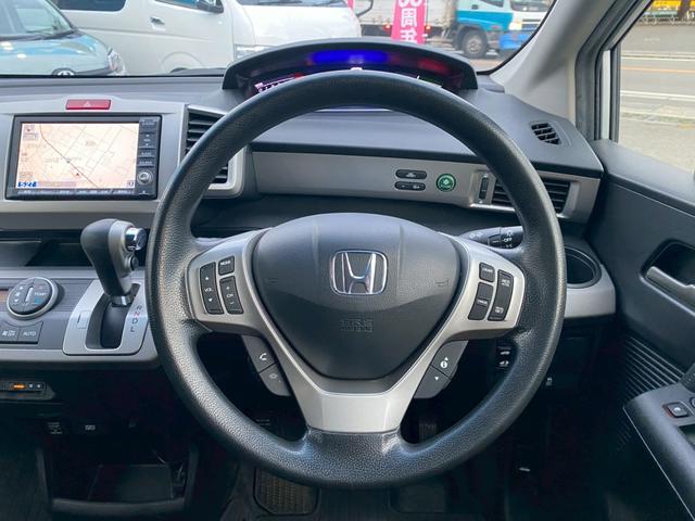 フリードハイブリッド ジャストセレクション　ハイブリッド　両側電動ドア　バックカメラ　禁煙車　ハーフレザーシート　スマートキー　ＥＴＣ　オートライト（15枚目）