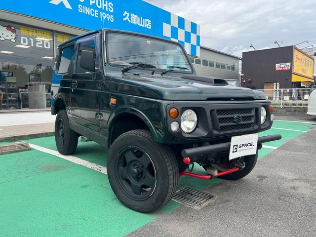 ＸＬリミテッド　５速ＭＴ　４ＷＤ　リフトアップ　ＥＴＣ　シートカバー　ルーフレール　ベネトンフォーミュラーワンハンドル　ターボタイマー　フォグランプ　純正１６インチアルミ　タイミングベルト交換済み(3枚目)